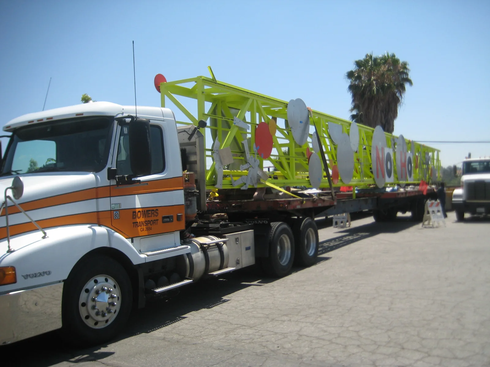 Long structural assembly secured to a Bowers Transport flatbed