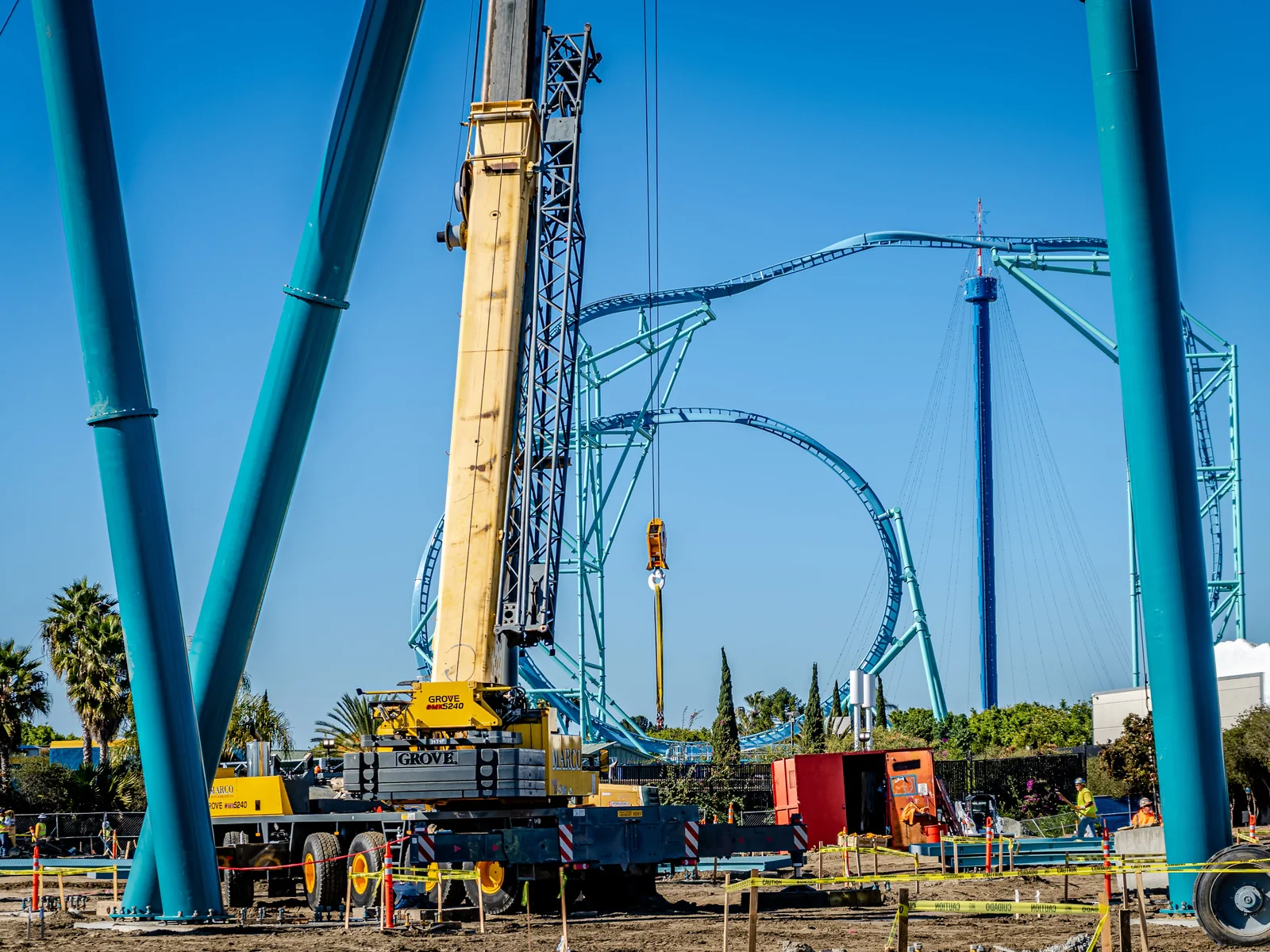 Mobile crane erecting steel supports within a roller-coaster structure