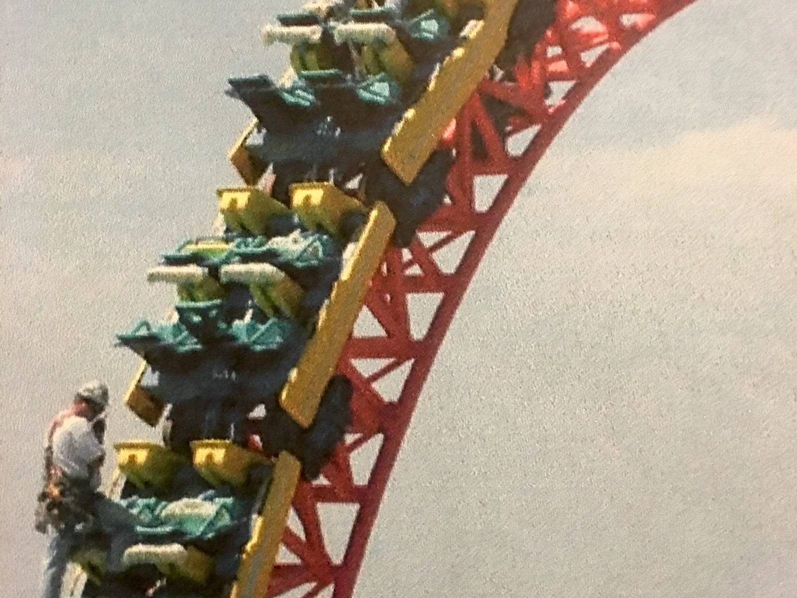 Crew working on a curved fabricated steel ride-track section